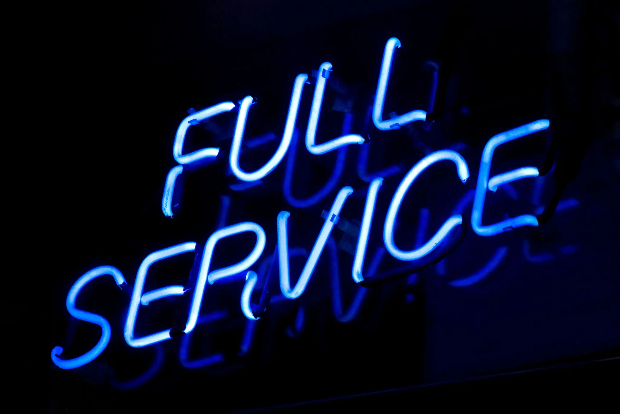 Blue neon Full Service sign